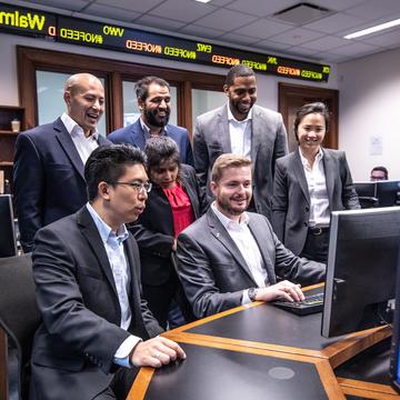 Group of MBA students working in the Rice Business Finance Center